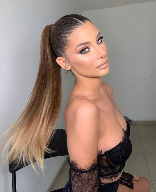 Aries Woman Wearing Sleek Ponytail Hairstyle