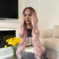 model 24-inch pink wavy lace front wig with a natural-looking hairline and flowing waves