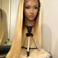 product Close-up of the Kennedy 36 blonde lace front wig, highlighting the pre-styled ombre and 360-degree lace construction