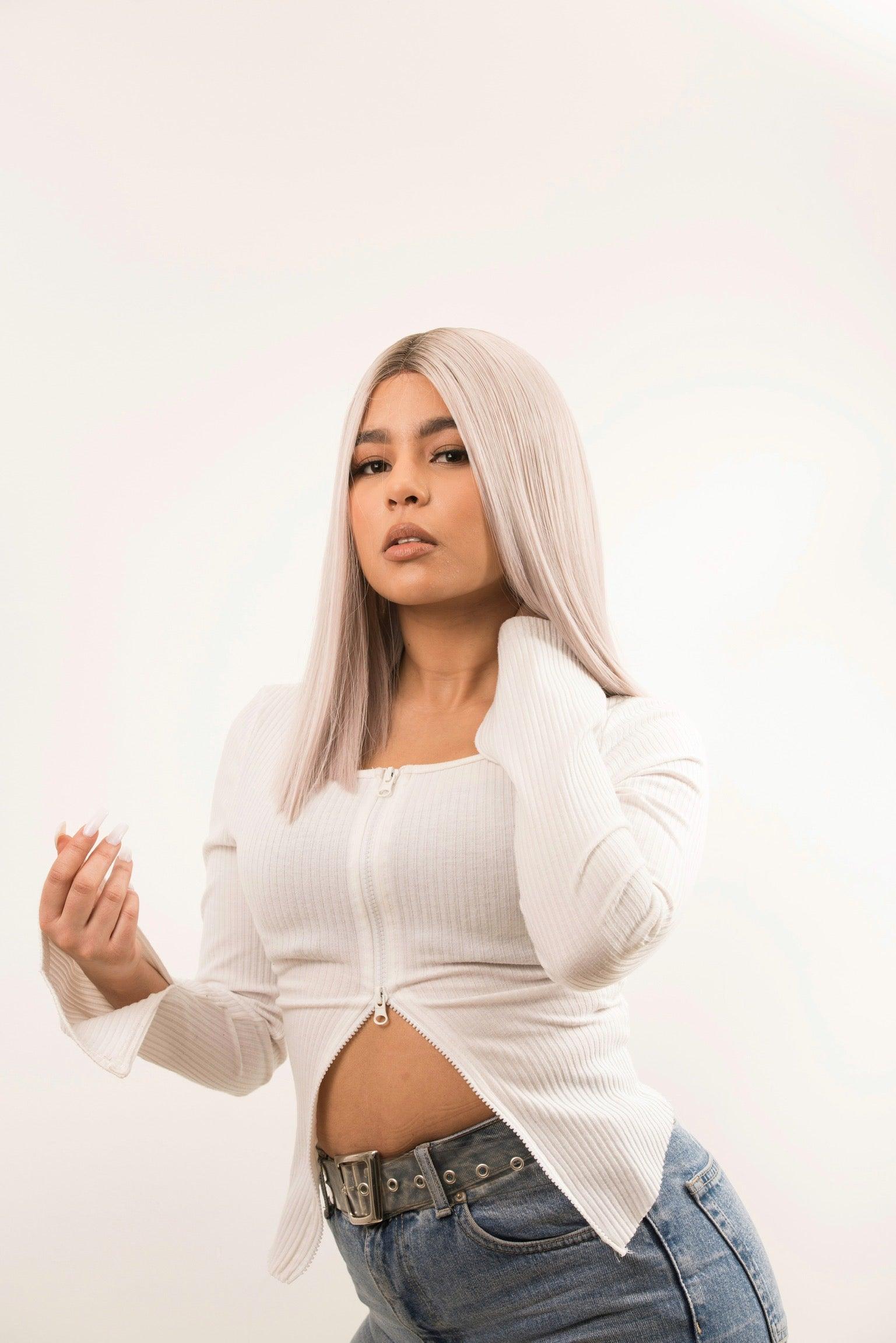 Full view of the Platinum Highlight Long Bob Wig displaying its chic lob hairstyle and vibrant color