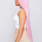 Long pink synthetic wig with vibrant hair, perfect for making a bold style statement