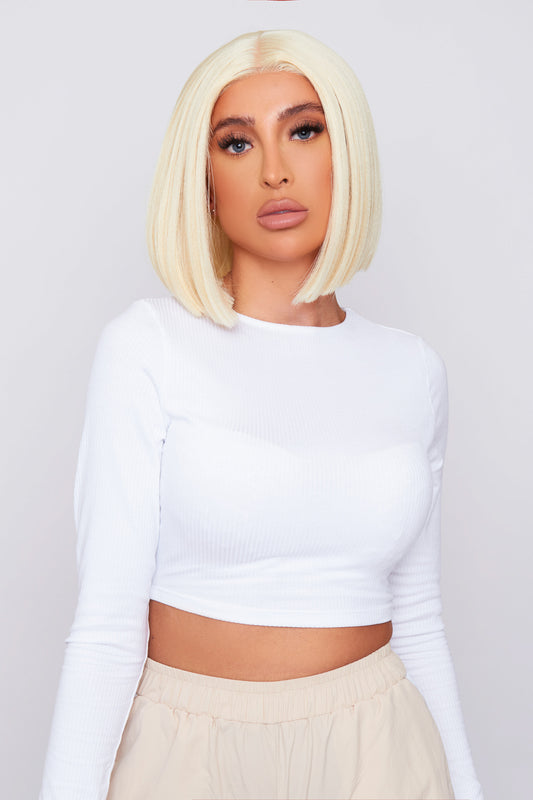model 10-inch blonde lace front bob wig with a sleek cut and natural hairline, made from high-quality synthetic hair
