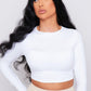 black body wave wig, emphasizing the natural movement and rich color of the synthetic hair