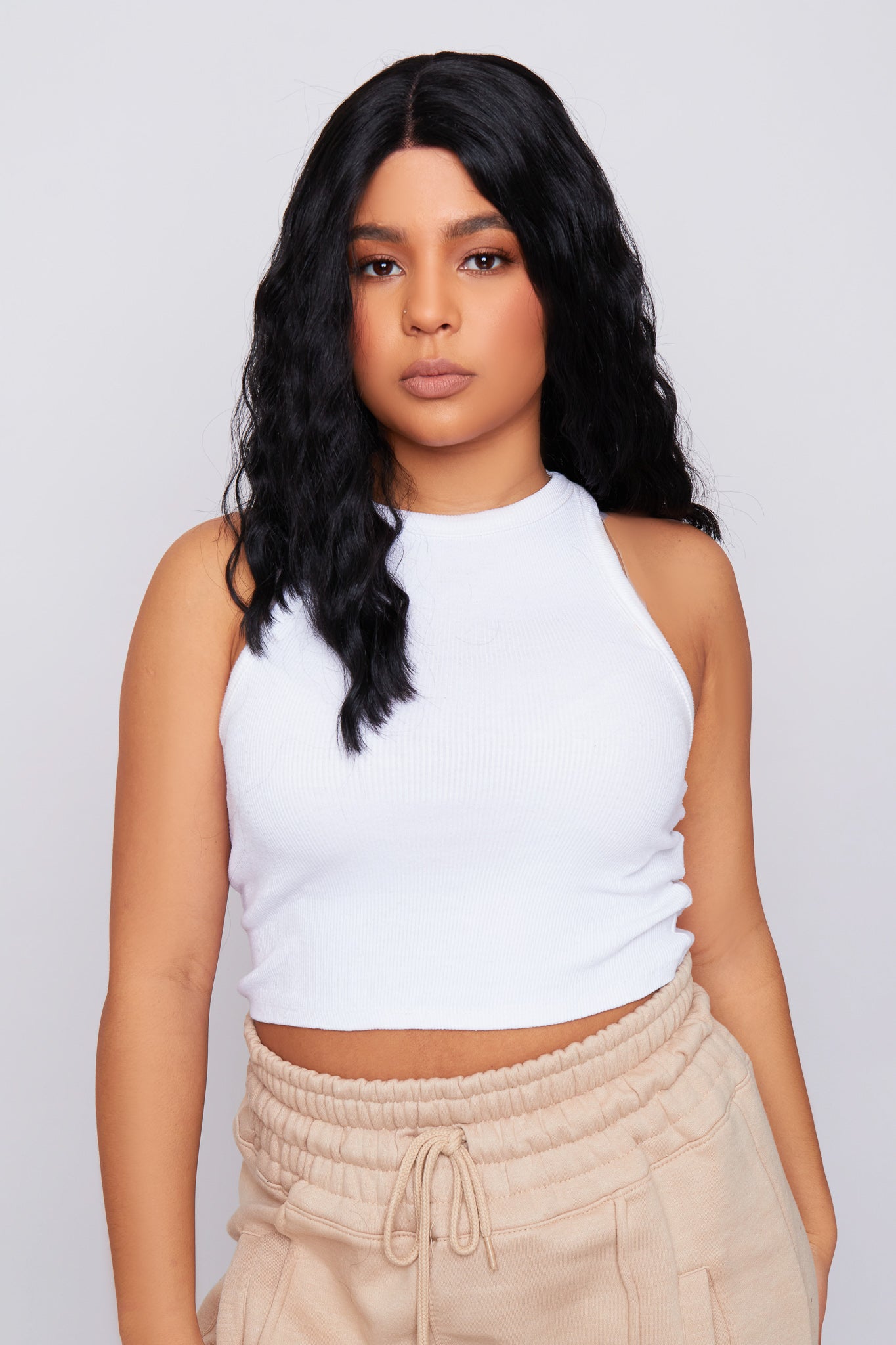 Full view of a wavy black bob wig, showcasing its modern cut and natural-looking texture