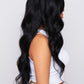 Side view of a black lace front wig with long waves, emphasizing the natural movement and rich color