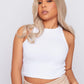 model mixed race girl in natural blonde non lace synthetic hair wig wearing white top