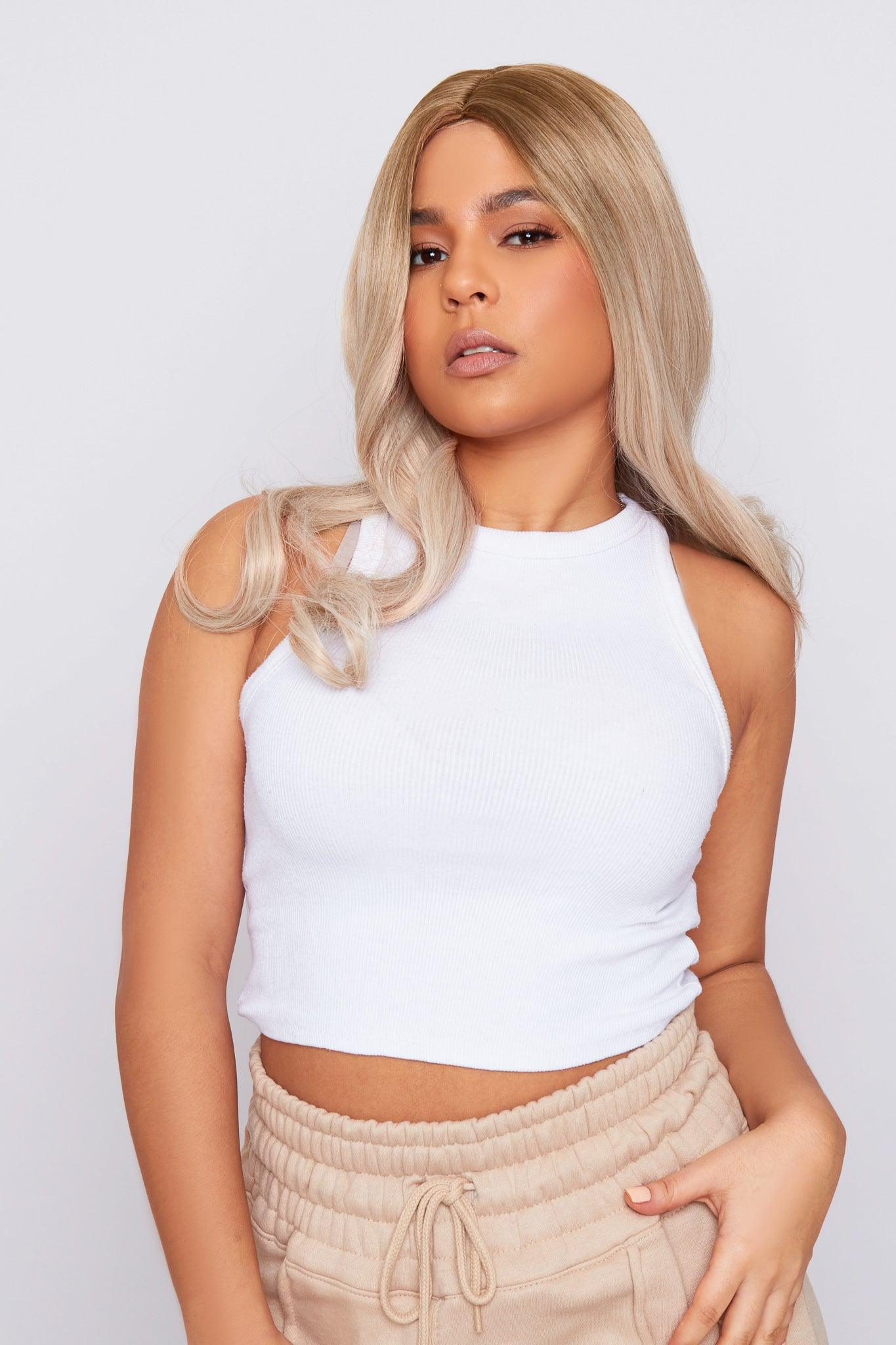 model mixed race girl in natural blonde non lace synthetic hair wig wearing white top