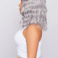model Side view of a grey bob wig with a short length and no lace, emphasizing the sleek design and color