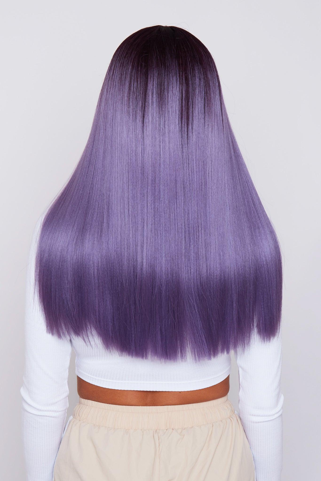 product Back view of a long straight purple wig, emphasizing the vibrant color and silky smooth finish